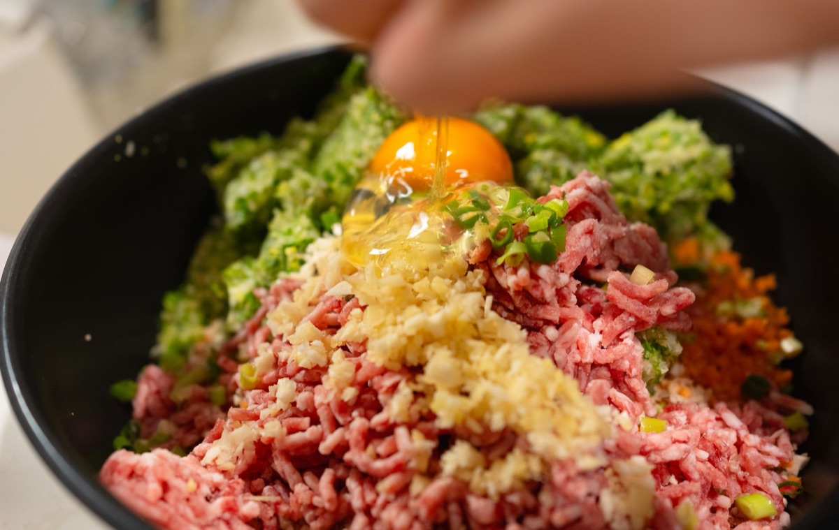 cat food mixing bowl with fresh ingredients